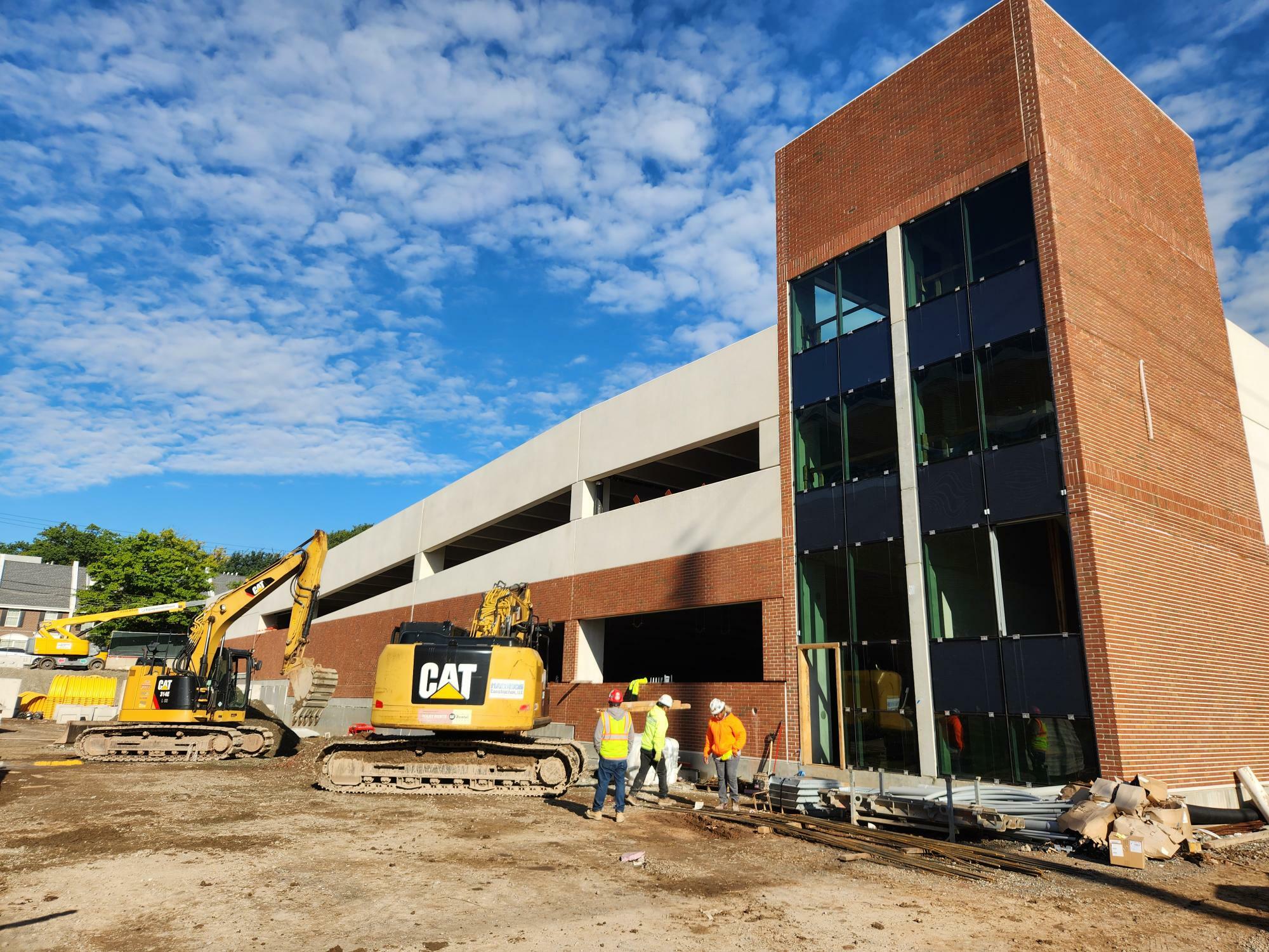 Side view of the Newark Police Station parking garage under construction.