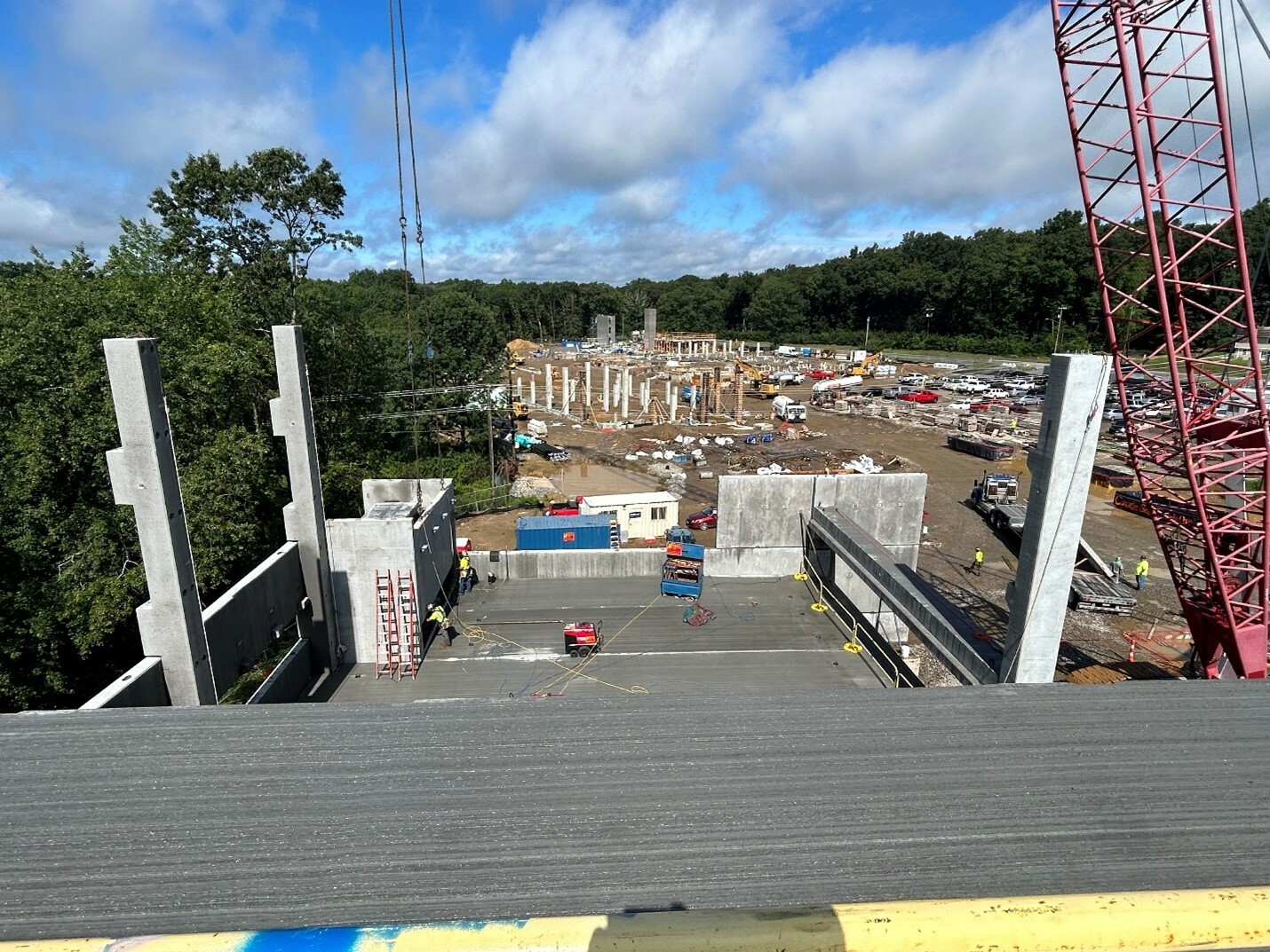 Roof view from a parking garage under construction.